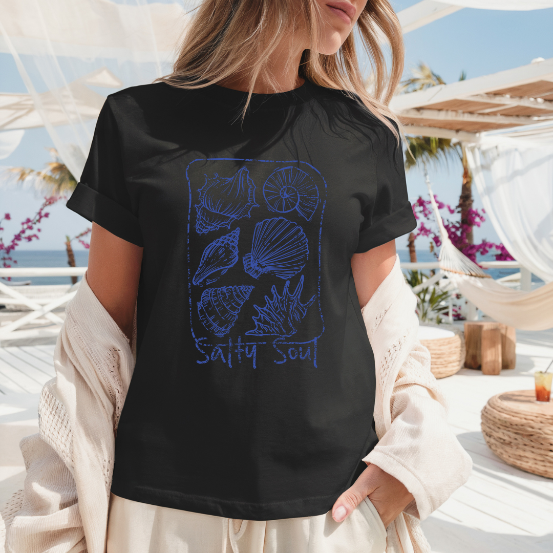 Camiseta casual de corte holgado con cuello redondo, manga corta, 100% Algodón, con gráfico de Conchas Marinas. Perfecta para el estilo diario.