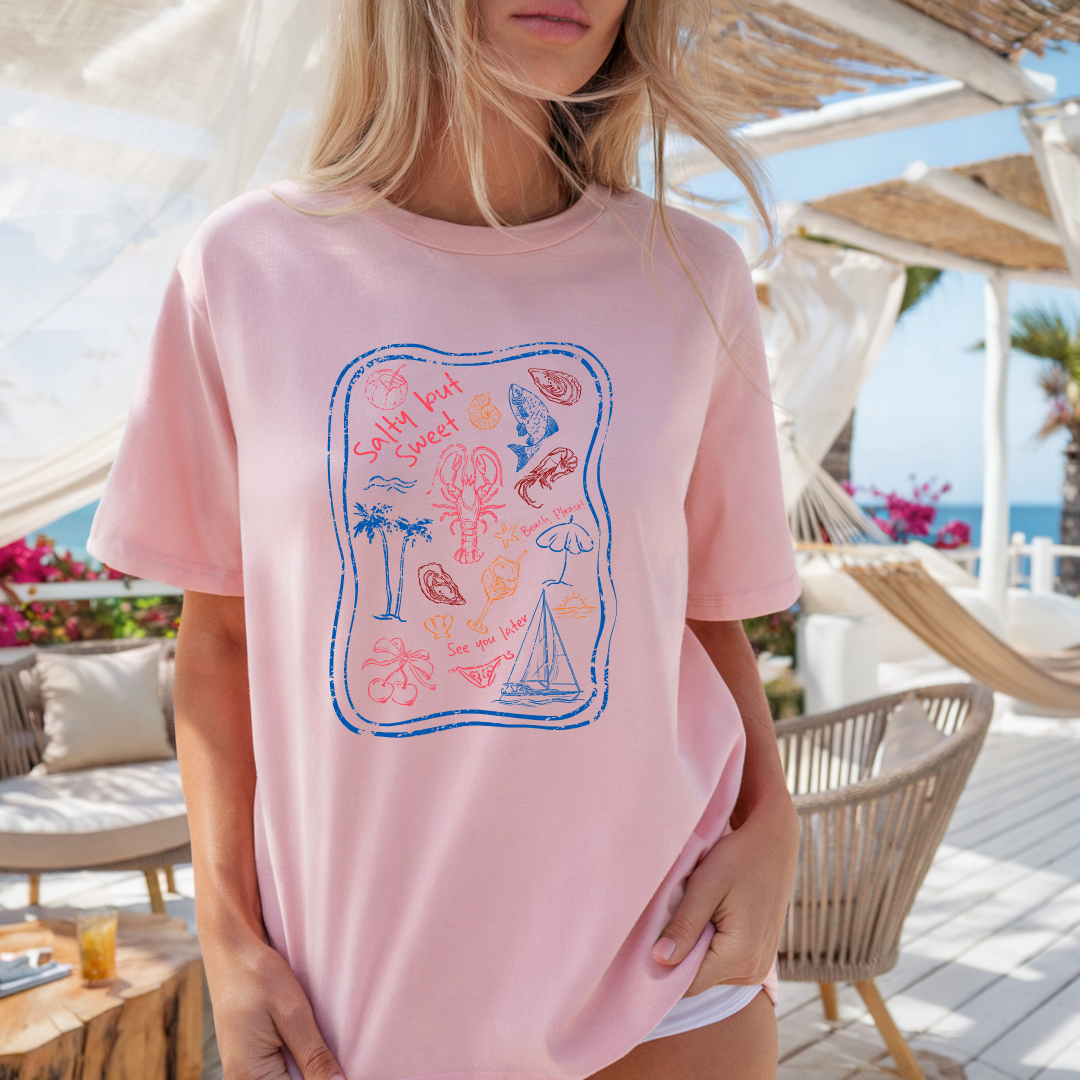 Camiseta casual de corte holgado con cuello redondo, manga corta, 100% Algodón, con gráfico de Figuras de Playa. Perfecta para el estilo diario.